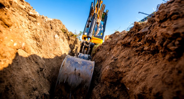 excavator-digs-the-foundation-for-the-house-picture-id1030870958