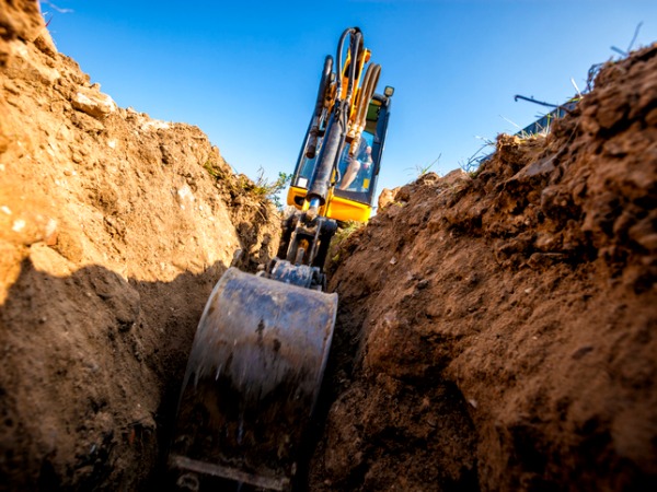 excavator-digs-the-foundation-for-the-house-picture-id1030870958600x450
